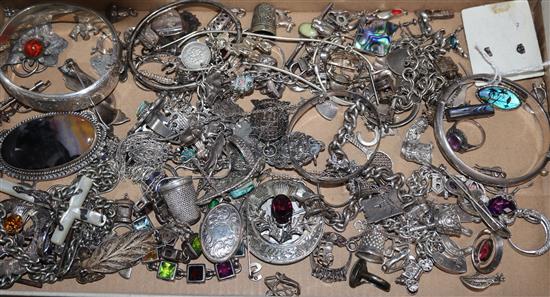 A mixed quantity of silver and other jewellery, including charm bracelets, bangles etc.